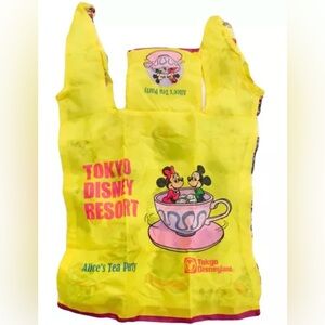 Tokyo Disneyland Yellow Alice's Tea Party Pouch NWOT